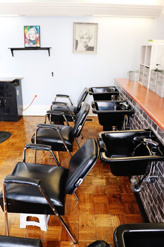 Modern salon amenities and comfortable seating area